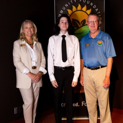 Executive Director Elizabeth Weese, Colin Price and President Ray Wyatt