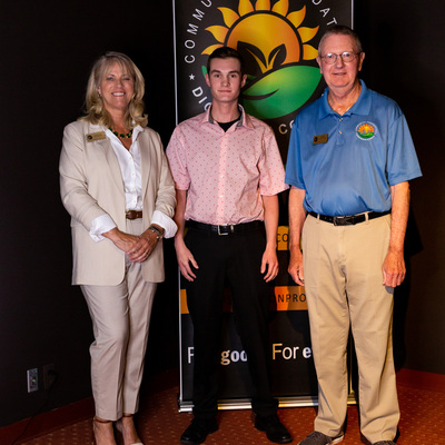 Executive Director Elizabeth Weese, Dominic Graves and President Ray Wyatt
